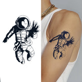 YICKYUE - 1pc Black Waterproof Temporary Tattoo Astronaut Universe Series Fake Tattoo Arm Tatoos Body Art Cool Cartoon Tattoo Sticker