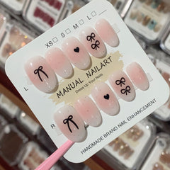 YICKYUE -  10Pcs Pink Handmade Press on Nails Short Blush Artificial False Nail Tips Black Bow Designed Sweet Girl Full Cover Fingernail