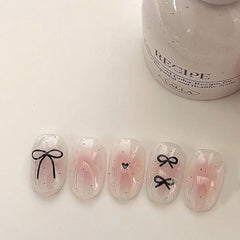 YICKYUE -  10Pcs Pink Handmade Press on Nails Short Blush Artificial False Nail Tips Black Bow Designed Sweet Girl Full Cover Fingernail