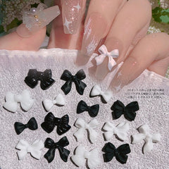 50pcs/lot Classic Black and White Nail Art Bows Resin 3D Nail Art Decoration DIY Manicure Design Simple Style Nail Accessories