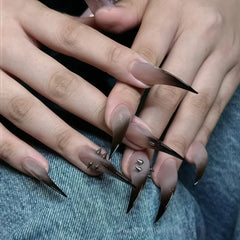 YICKYUE  -  10PCS of ultra-long pointed artificial nails, in black gradient color with metallic pointed decorations on the surface.